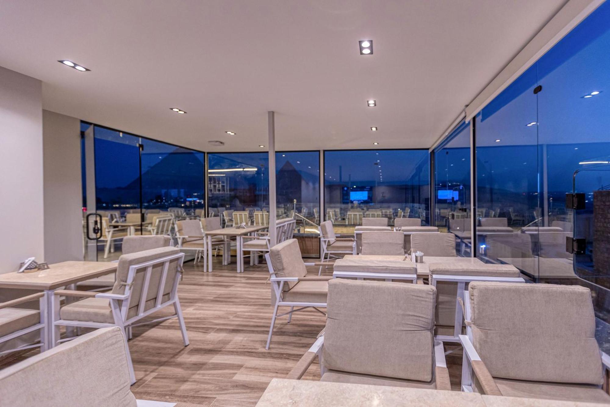 Gaia Pyramids Hotel Kafret el-Gabal エクステリア 写真